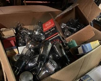 Many large boxes of radio tubes. All boxes were marked good tubes. Large quantity 01A, 80 and many others 