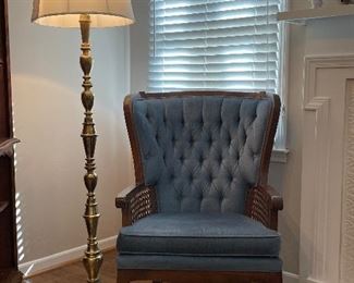 Brass floor lamp; Lewittes' tufted armchair with cane sides