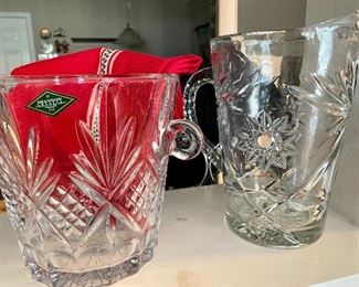 Shannon crystal ice bucket with red towel; cut glass pitcher