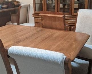 $240 - Oak table & chairs with leaf
