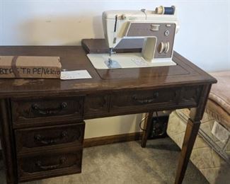 Sewing machine and cabinet