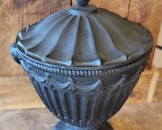 Cast iron urn, very large. $200.00