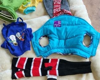 Dog bed-$20.00, outfits-$5.00 ea