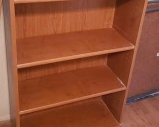 Medium-sized bookcases are both $35 each (2): 1' deep, 30" wide, 49" tall.
