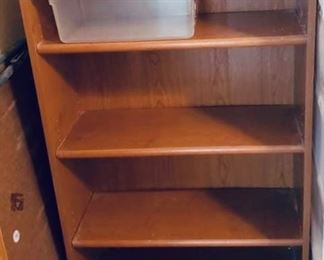Medium-sized bookcases are both $35 each (2): 1' deep, 30" wide, 49" tall.
