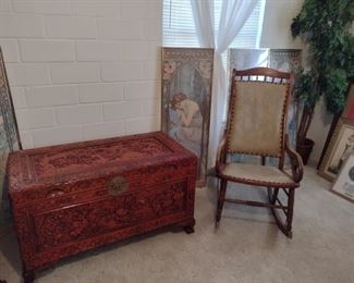 Carved Asian trunk, vintage rocking chair and beautiful art