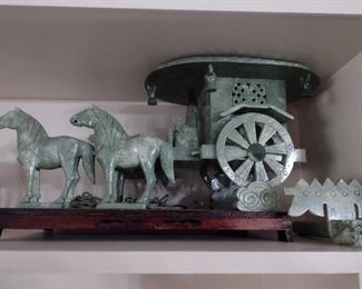 Stone carved horse and buggy