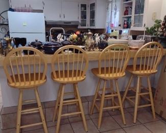 Four solid wood bar stools