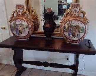 Entry table with beautiful Asian vased and a gorgeous mirror
