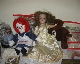 Old doll and Raggedy Ann