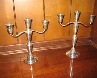 Pair of sterling candlesticks adjustable sizes