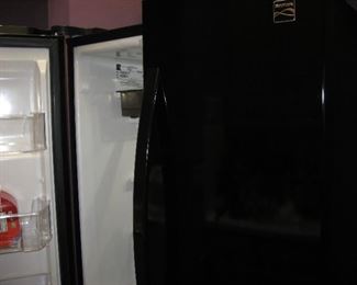 Black front Kenmore Fridge  side by side doors with bottom freezer and icemaker  2 years old