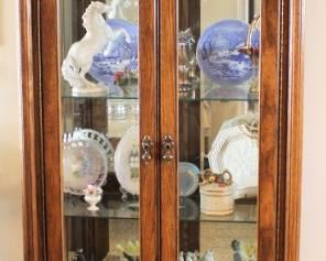 Curio cabinet filled with treasures.