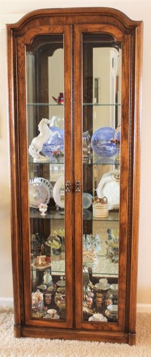 Curio cabinet filled with treasures.