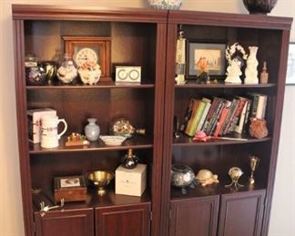 Bookcase with books and decorative items.