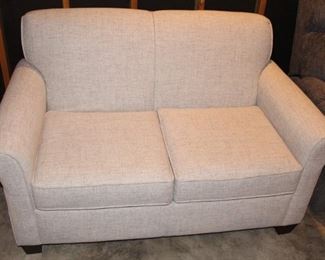 This small loveseat is basically brand new.  Purchased November of 2021.
