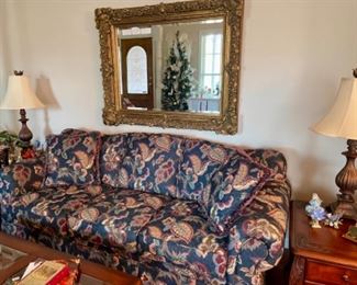 Navy floral sofa by Hickory Hill, ornate large gold mirror, pair of newer lamps