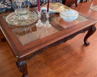 Clawfoot coffee table with glass inserts