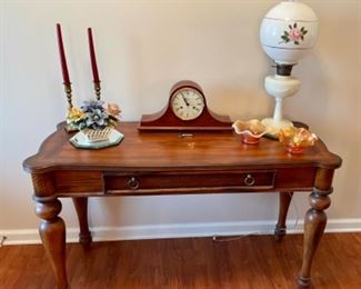 Aladdin Lincoln Drape Lamp, Howard Miller mantle clock, Capodimonte flowers, Sofa table