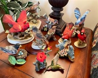 lots of porcelain bird figurines