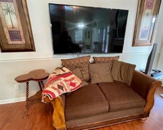 LG 65" smart LED TV, pair of palm tree pictures, brown loveseat (sorry, family is keeping quilt)