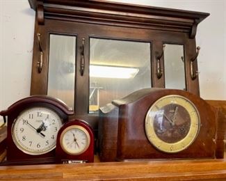 several clocks, Hanging mirror/coat rack
