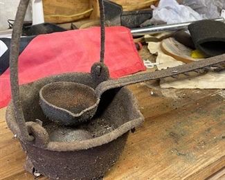 cast iron small kettle and ladle