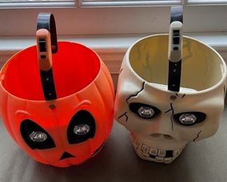 Halloween buckets with light-up eyes.