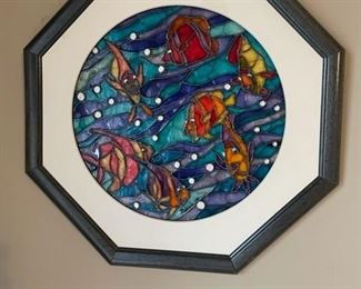 Stained fish in octagonal frame from Spain.