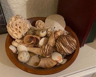 Wooden bowl with seashells