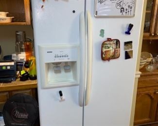 Side by side fridge works great. Keeps our beverages nice and cool.