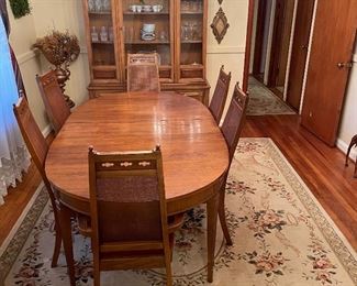 Dining room table, chairs and China caninet