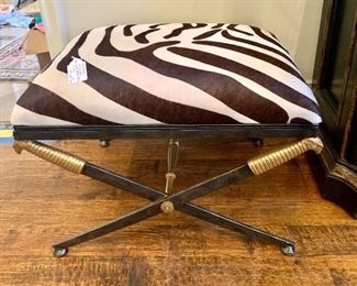 Pair of Maitland Smith faux zebra hide & iron benches