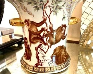 Pair of asian monkey vases