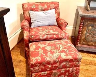 Pair of swivel chairs with ottomans