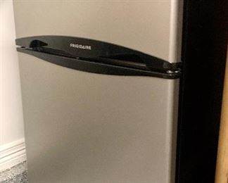 Mini fridge with freezer section