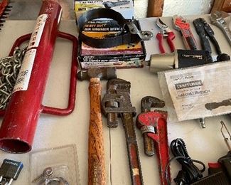 Fence pole driver, large pipe wrench
