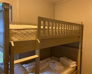Pale olive Restoration bunk beds $850.   Each bed is 79.5"l x x 43"w x  70" h when "bunked".  Can be separated into two twin beds each headboard is 39.5"h.  New $1400 w/o mattress shipping or tax!