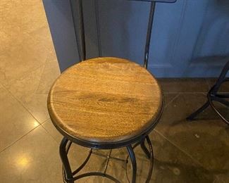 One of four counter/bar height bar stools for sale.  Adjustable  16"diameter at the base,  15" diameter at the seat,  as shown it is 26 inches h at the seat and 39" high at the back.   $500 for the set of four.