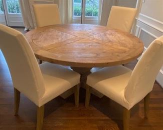 Restoration Hardware dining table and chairs sold as a set.  will consider separating if we get someone wanting just the table and another just the chairs- details and pricing in following photo.