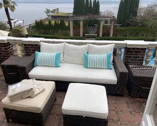 outdoor wicker from Pottery Barn shown with cushions.  Spare cover set available in a light taupe included