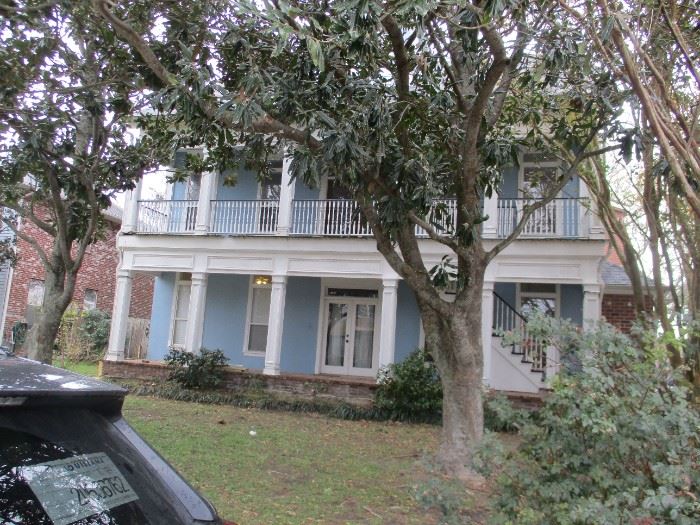 Facade of New Orleans area mansion-- three floors