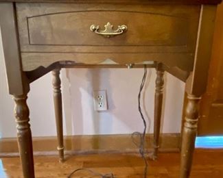 Sewing machine and cabinet