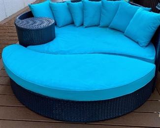 Outdoor wicker sofa and ottoman
