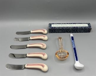 Funky Butter Knives With A Couple Of Unique Spoons