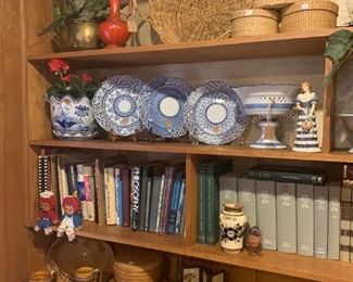 Blue and white dishes, books, baskets and other accents