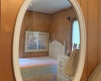 White oval mirror