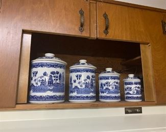 Set of blue and white canisters