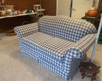 Blue and white checkered sofa