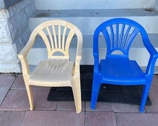 Two plastic children's chairs